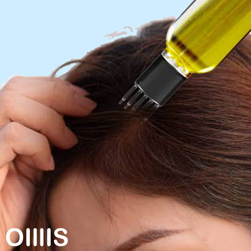 روغن تراپی پوست با اپلیکاتور روغن برای آبرسانی مو که یک خانم در حال روغن تراپی پوست خود است